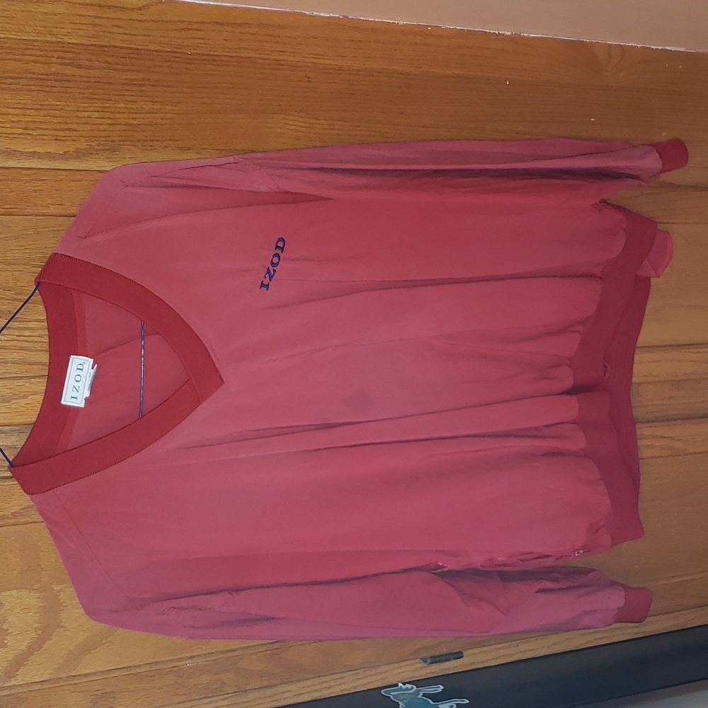 Izod Men's pullover lightweight jacket w/zippered pockets in red Nylon material.